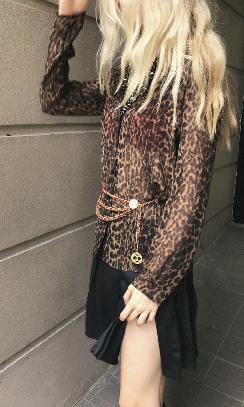 Sheer leopard silk shirt with a vintage gold chain belt